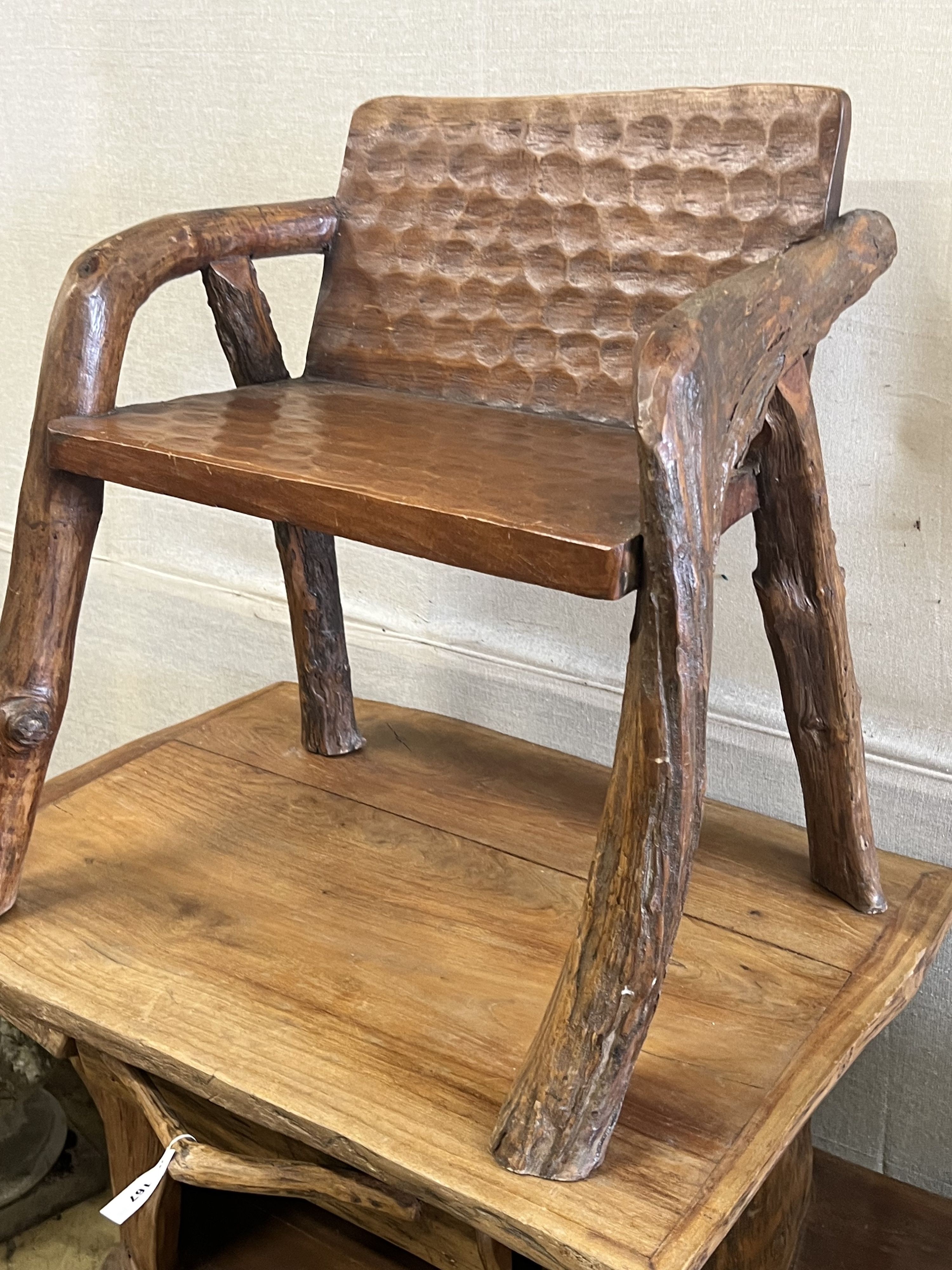 A rustic fruitwood side table and chair, table width 148cm depth 62cm height 81cm